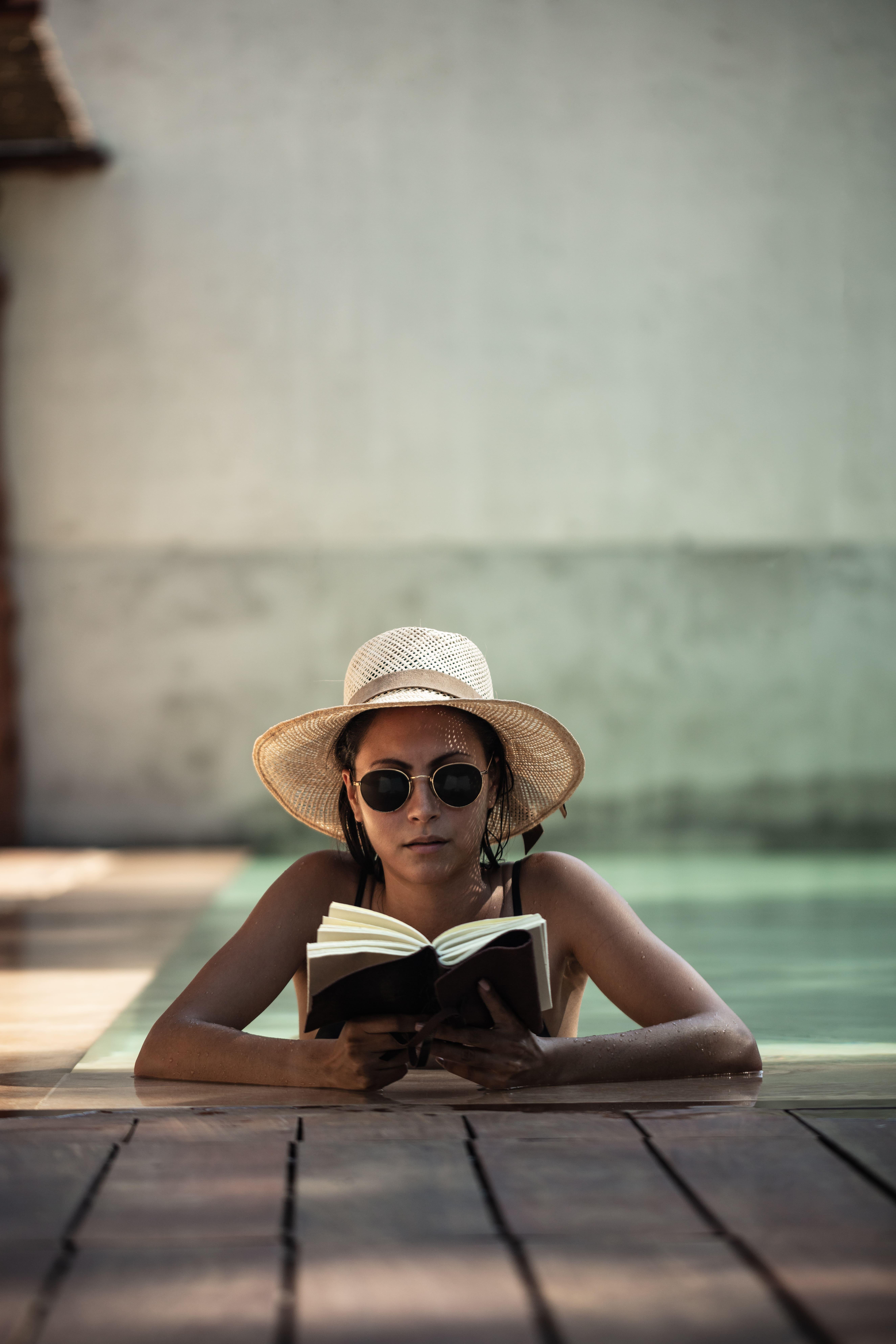 Oku Ibiza (Adults Only) Hotel Sant Antoni de Portmany Екстериор снимка A woman wearing a hat